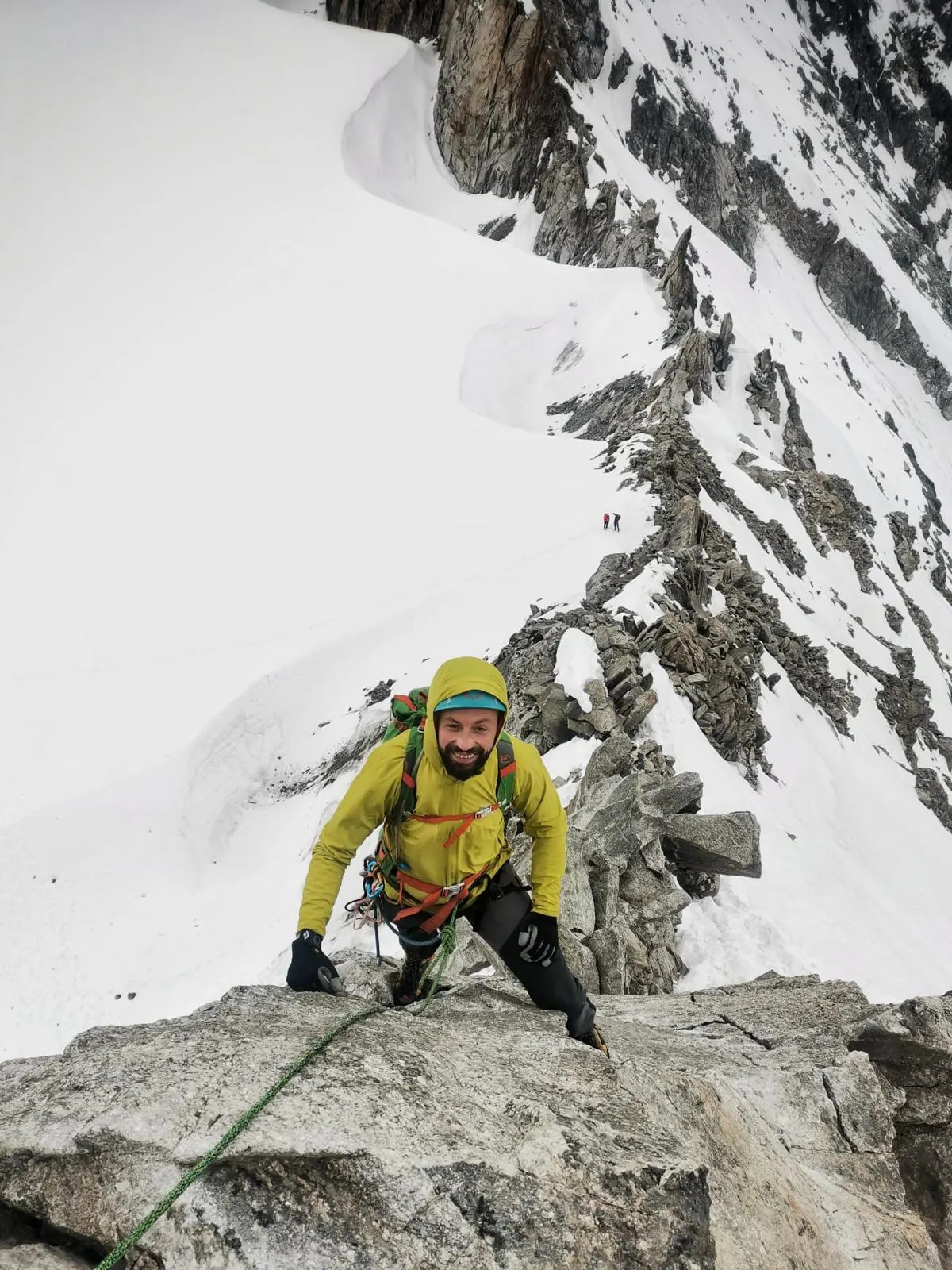 Alpine climbing in snowy mountain terrain